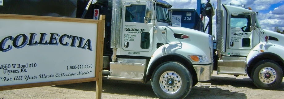 Photo of two Collectia trucks next to their sign outside of their business.
